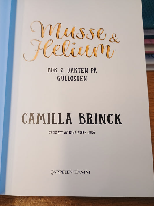 Musse og Helium, Jakten på gullosten, Camilla Brinck